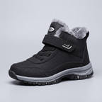 Fur lined winter boot in Black, three-quarter view, plush collar and hook-and-loop strap