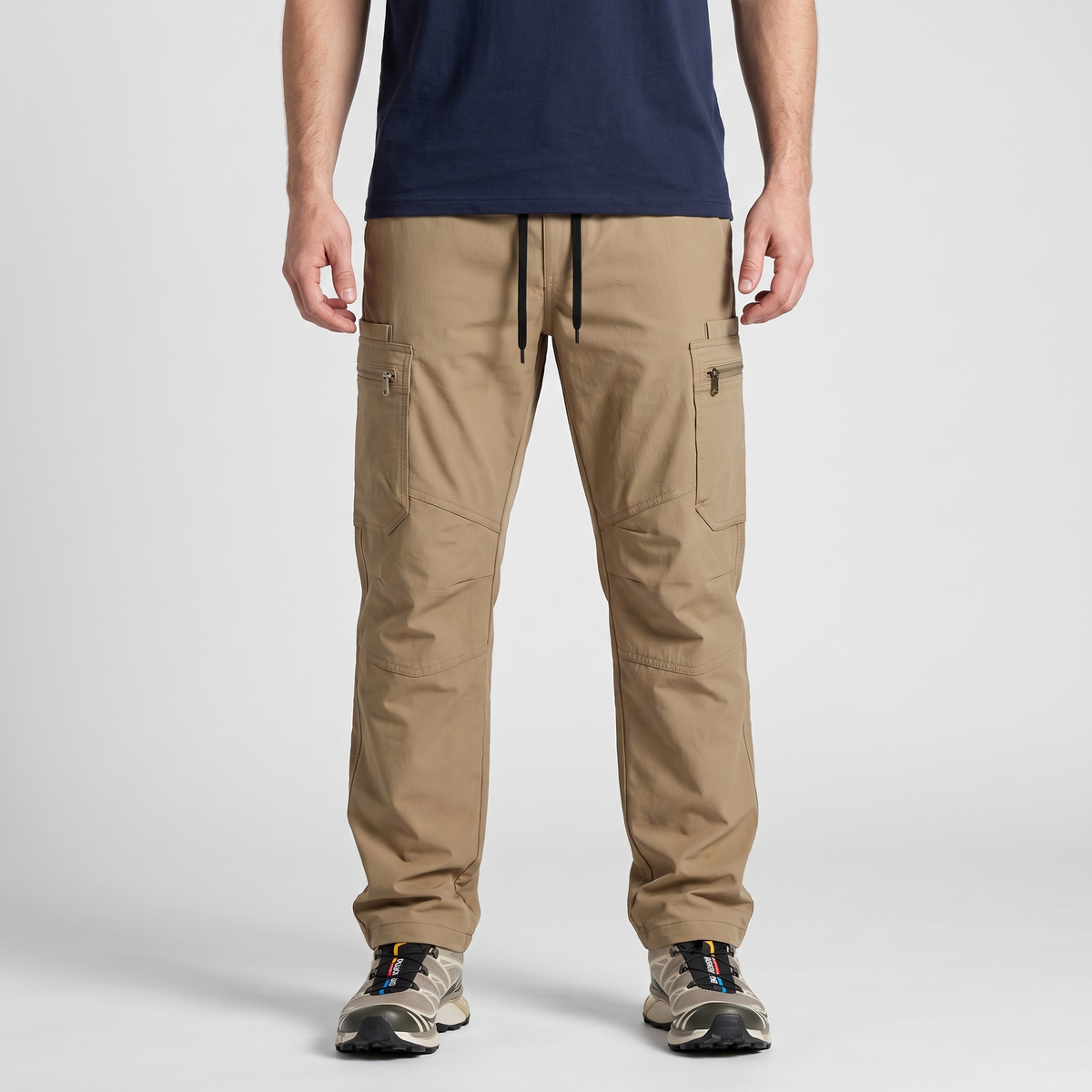 Men's combat trousers in Dark Khaki, front view, elasticated drawcord waist and zipped thigh pockets