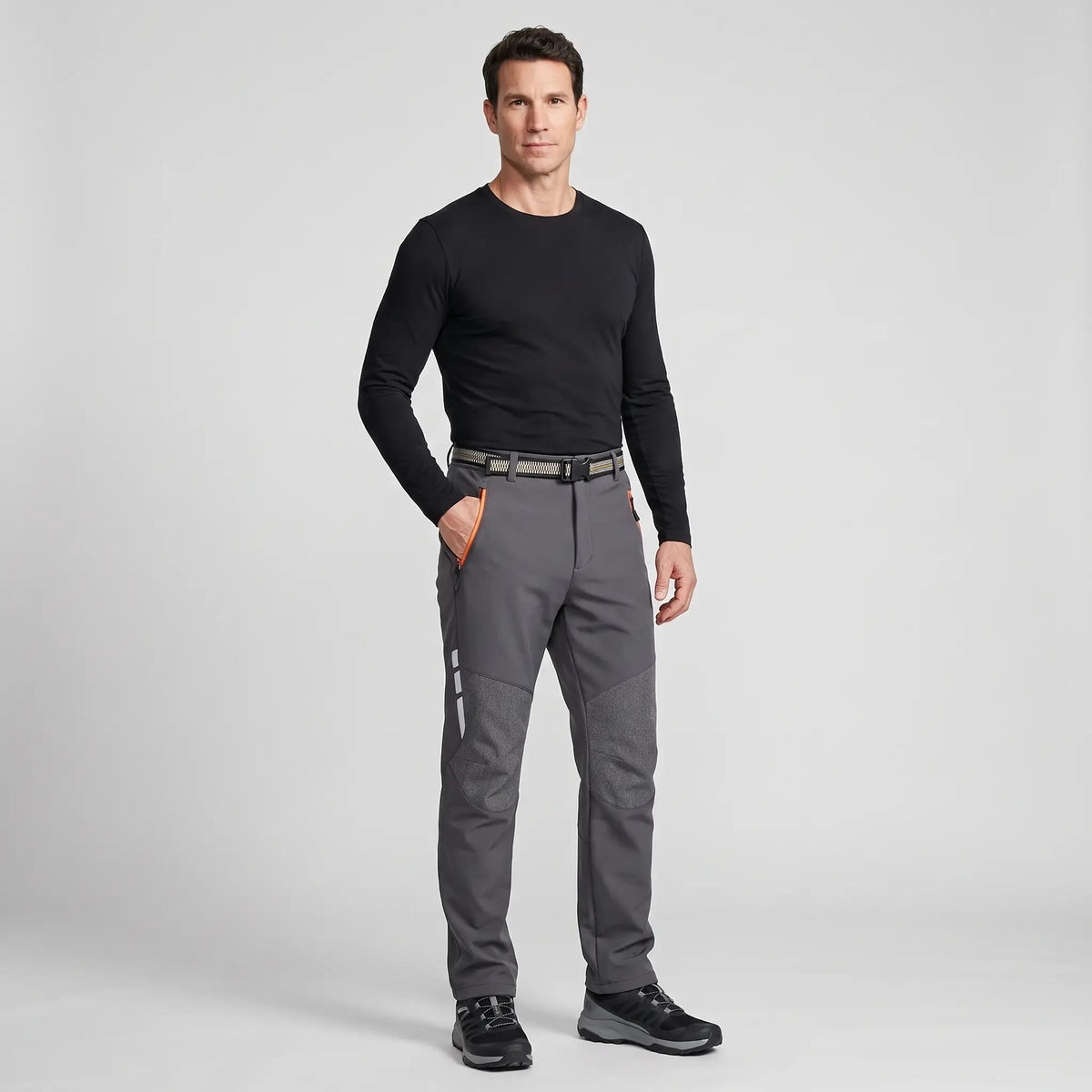 Men's fleece lined walking trousers in Dark Grey, full-length studio view on a man