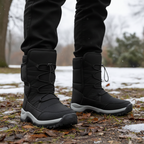 Fur lined snow boots for women and men in Black, worn outdoors