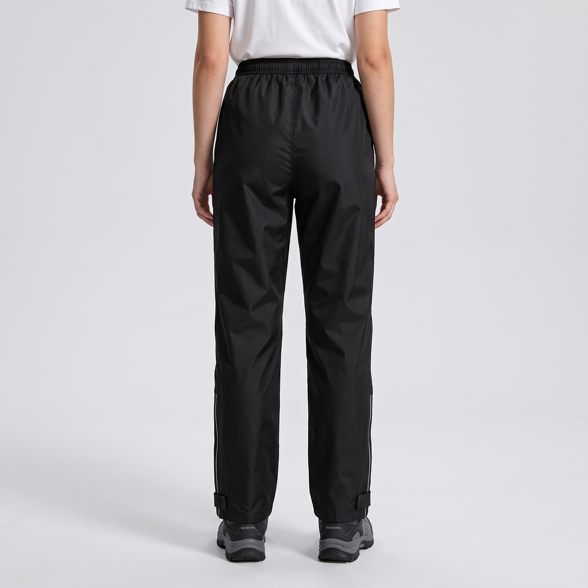 Women's rain trousers back view, plain back with elasticated waist all round