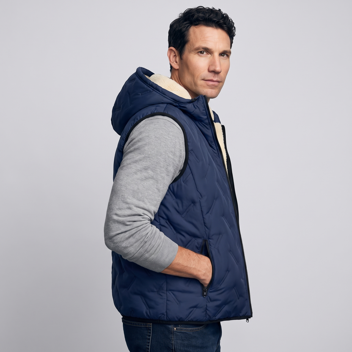 Navy hooded gilet, three-quarter side view