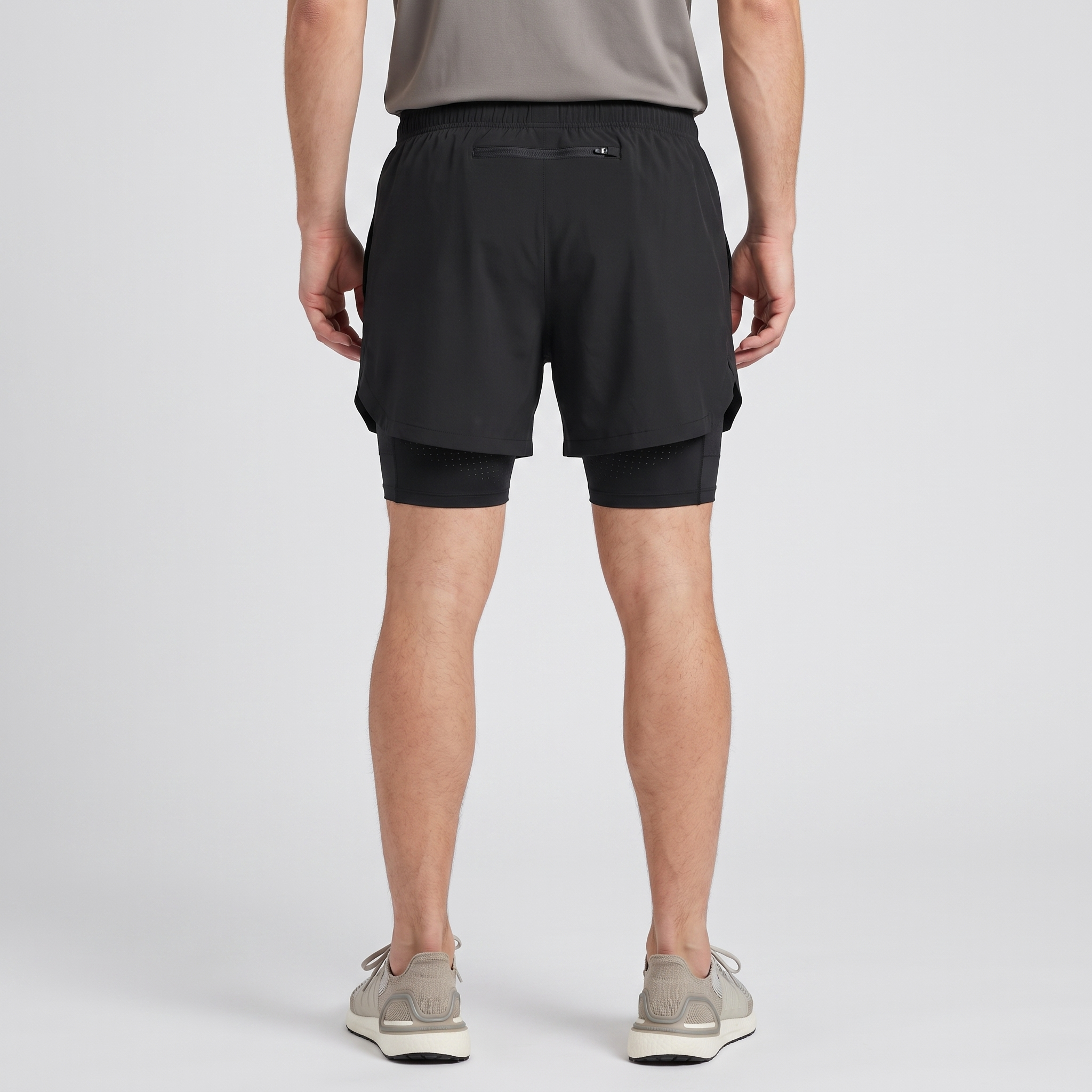 Back view of the Black 2 in 1 running shorts showing the zipped rear pocket