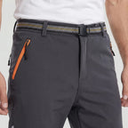 Men's fleece lined walking trousers, close-up of the webbing belt, buckle and zipped pocket