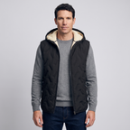 Man wearing the black hooded gilet