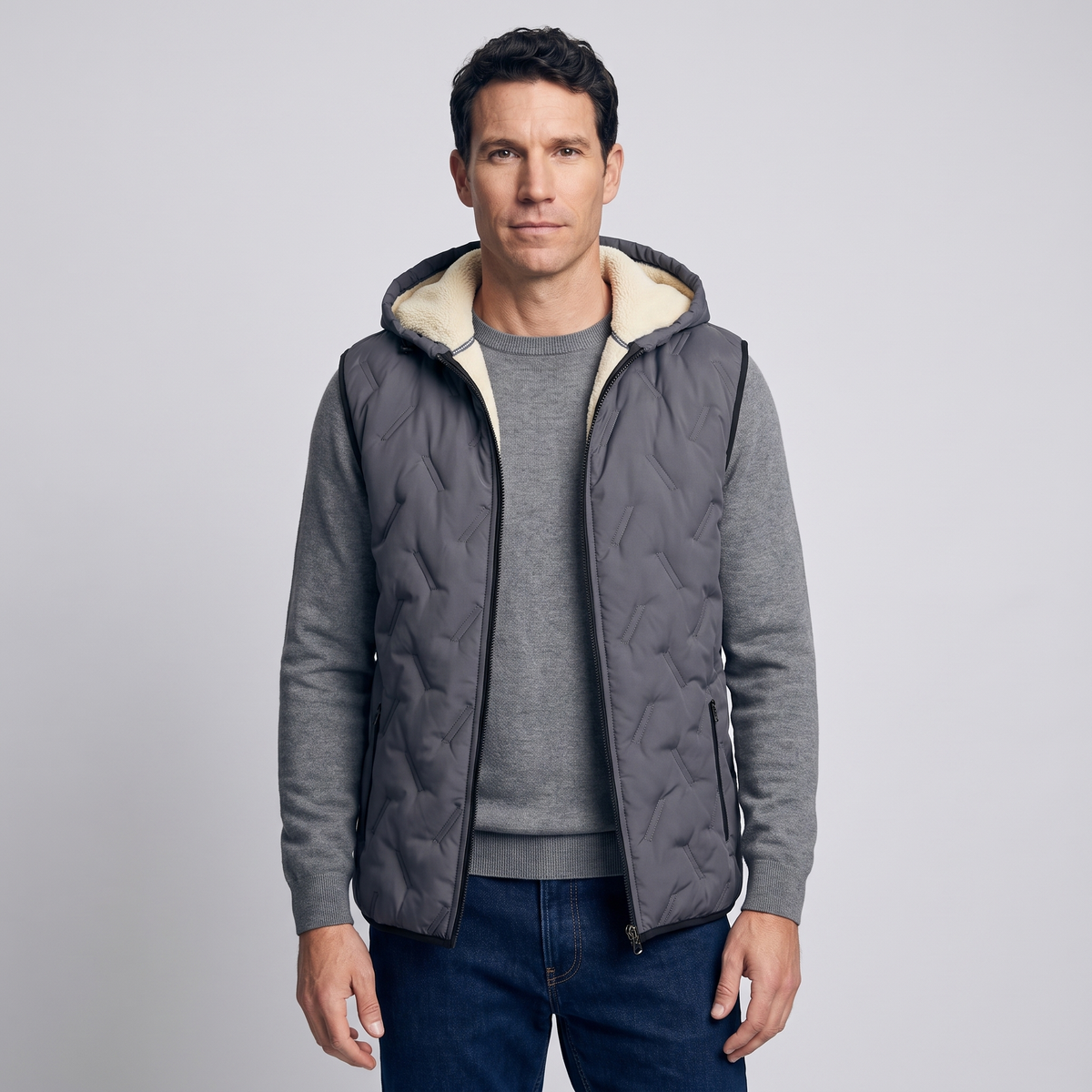 Man wearing the dark grey hooded gilet