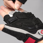 Pull tabs between the fingers used to take the cycling gloves off in one motion