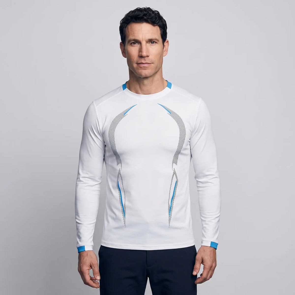 Man wearing the long sleeve running top in White, front