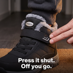 Fingertips pressing the hook-and-loop strap shut on a worn winter boot - press it shut, off you go