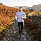 Running a fell path in the Lake District in the long sleeve running top