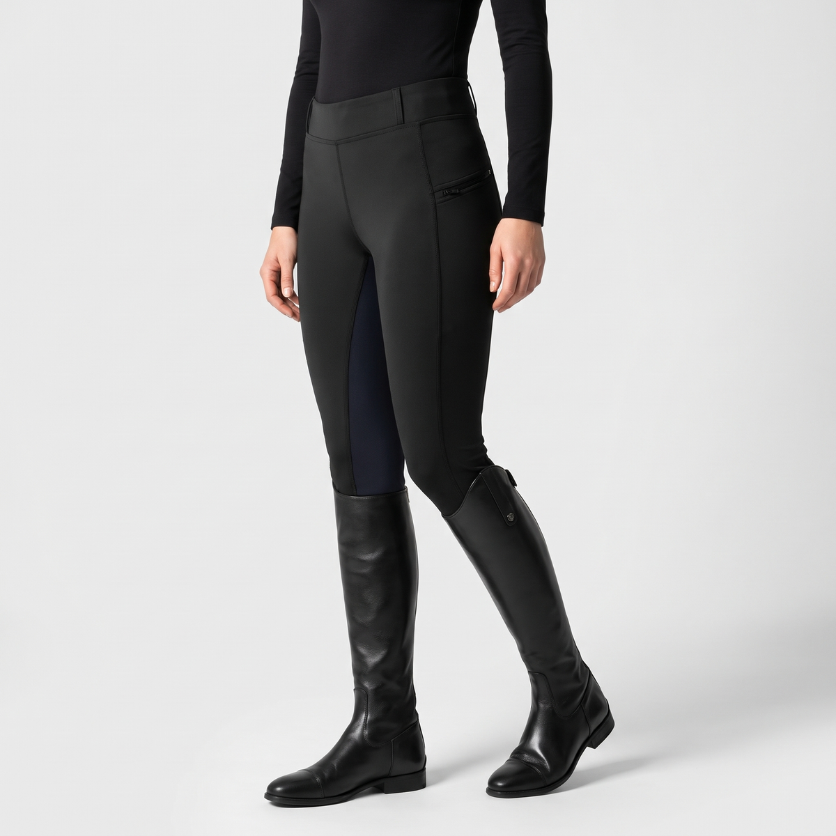 Black pull-on jodhpurs from the side with the zip pocket