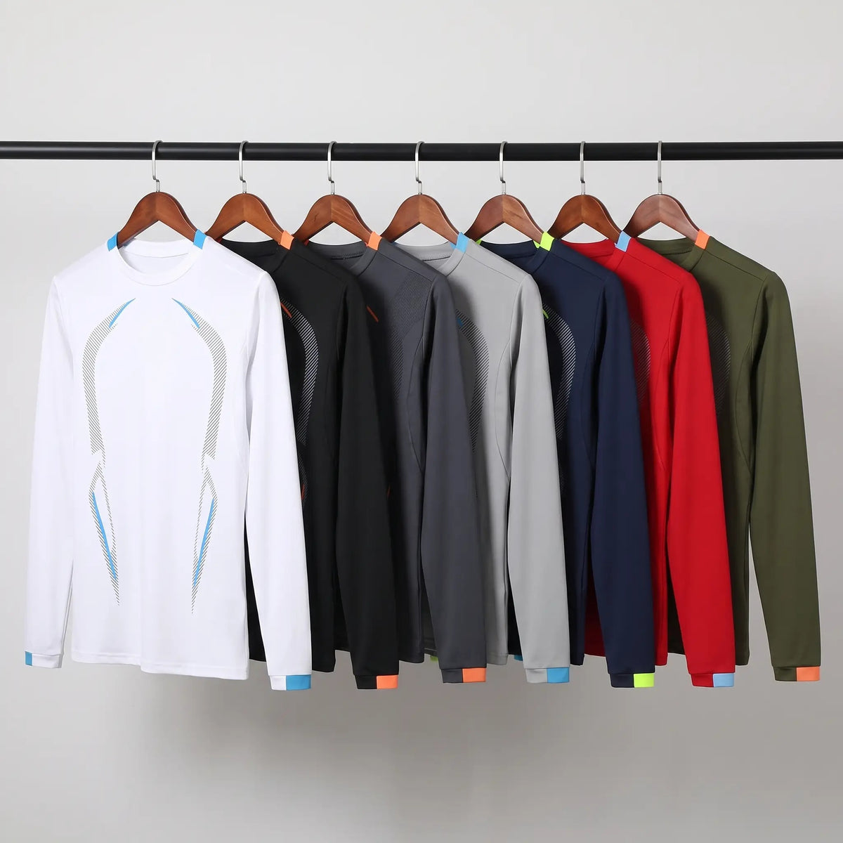 Long sleeve running top in all seven colours on a rail