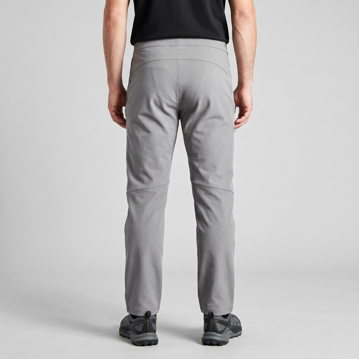 Men's grey walking trousers worn, back view