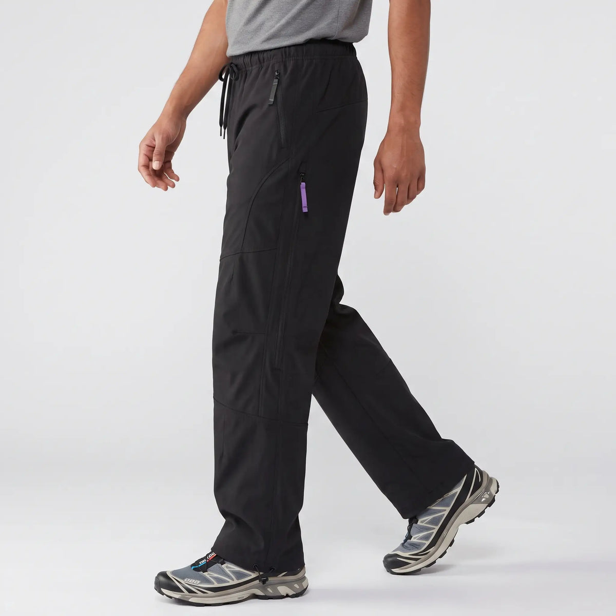 Side view of the Black Terrabound wide-leg Hiking Trousers showing the full-length side-seam zip
