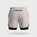 Back view of the Black 2 in 1 running shorts showing the centred zipped rear pocket