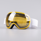 Golden ski goggles with yellow frame and white strap