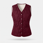 Women's quilted gilet in Burgundy, fleece lined V-neck front with metal poppers and hip pockets