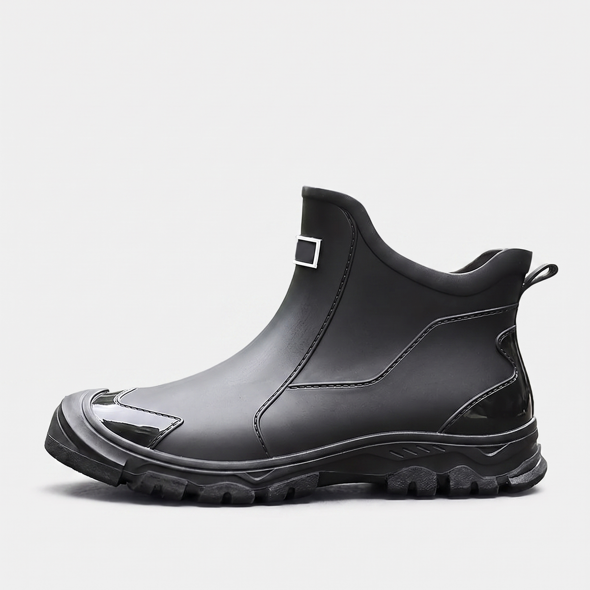 Black ankle wellies, short slip-on wellington boots with a lugged sole