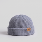 Light grey ribbed fisherman beanie with a turned cuff