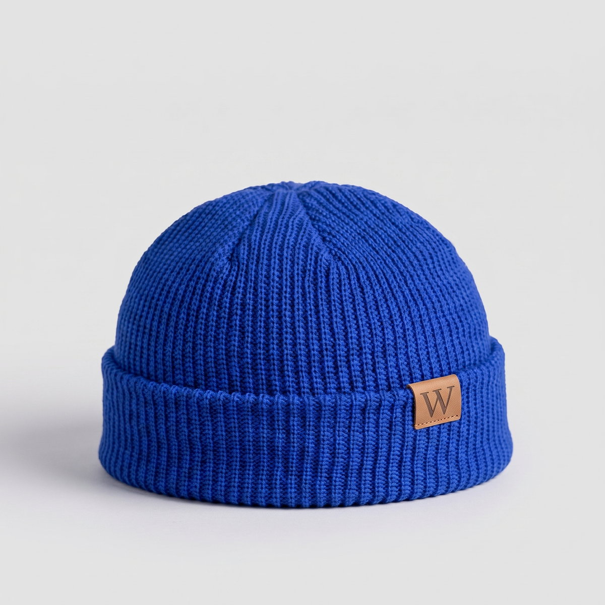 Royal blue ribbed fisherman beanie with a turned cuff