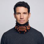 Knitted Snood neck gaiter in Black/Orange, worn round the neck, front view