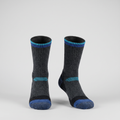 Navy thermal ski socks with blue and turquoise cuff stripes, front view