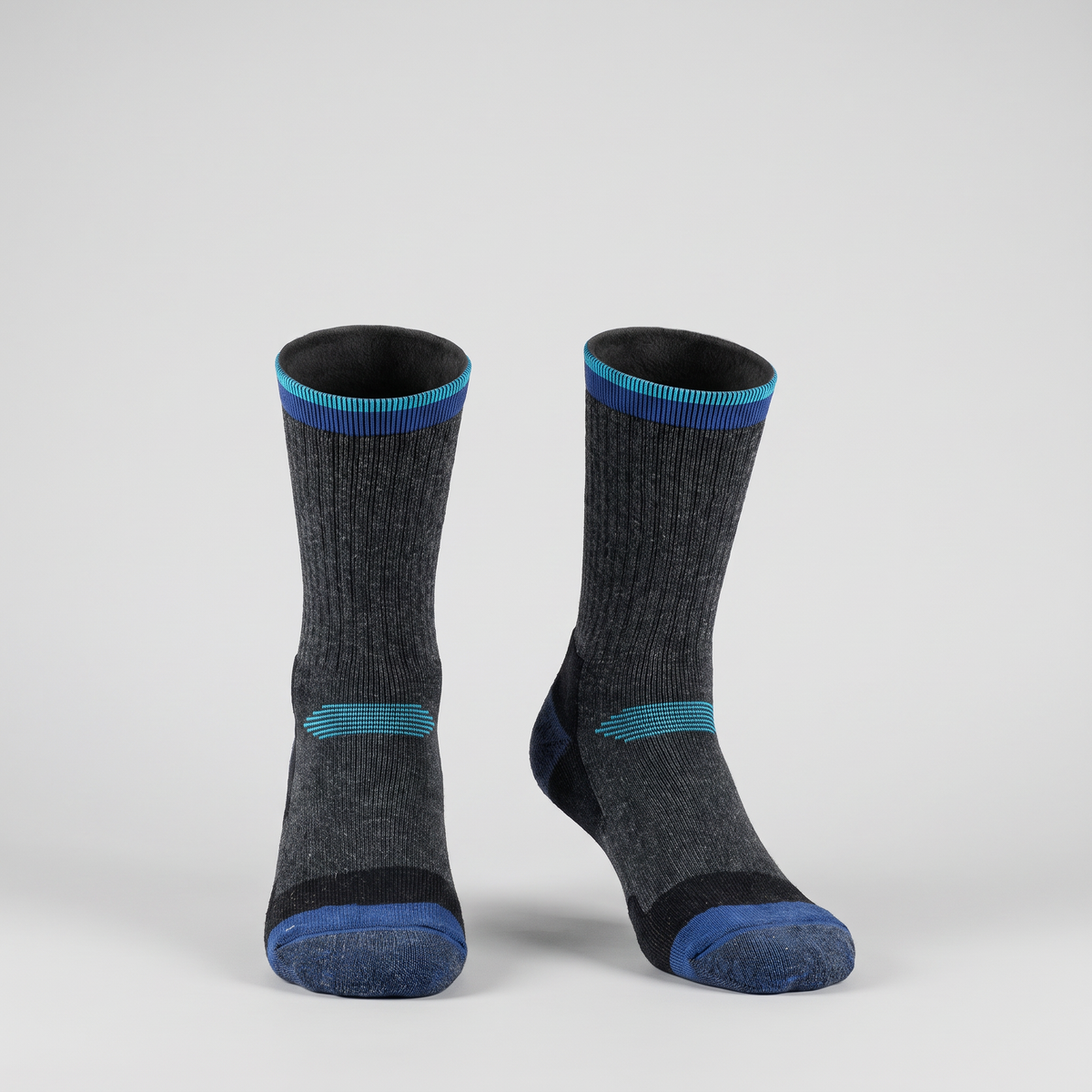 Navy thermal ski socks with blue and turquoise cuff stripes, front view