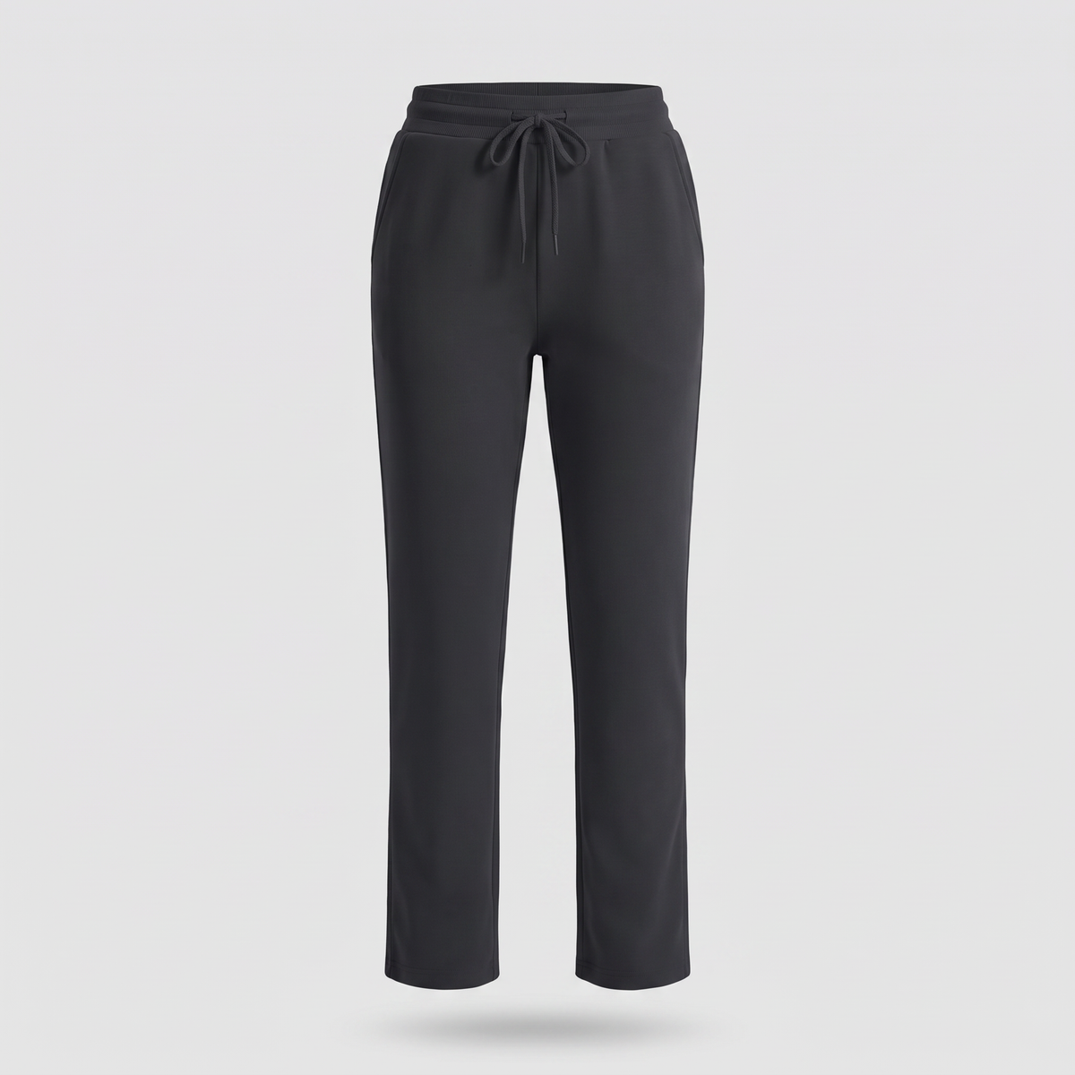 Women's fleece lined joggers in black, front view with drawcord waist, side pockets and straight legs