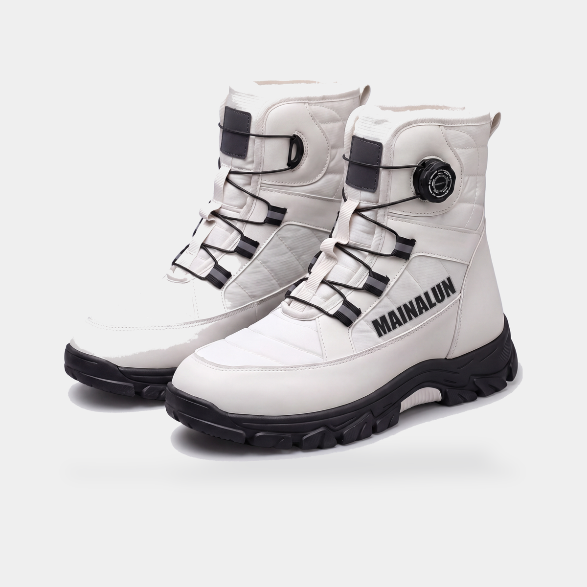 White MAINALUN snow boots with rotary dial fastening, pair, three-quarter front view