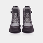 Straight-on front view of the snow boots showing both rotary dials and the full shaft height