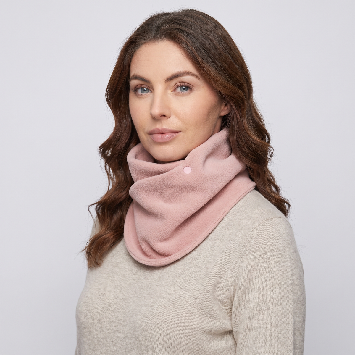 Fleece Snood neck warmer in Blush Pink, three-quarter view showing the two poppers