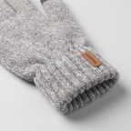 Close-up of the soft brushed knit and deep ribbed cuff with the leather iwarm tab