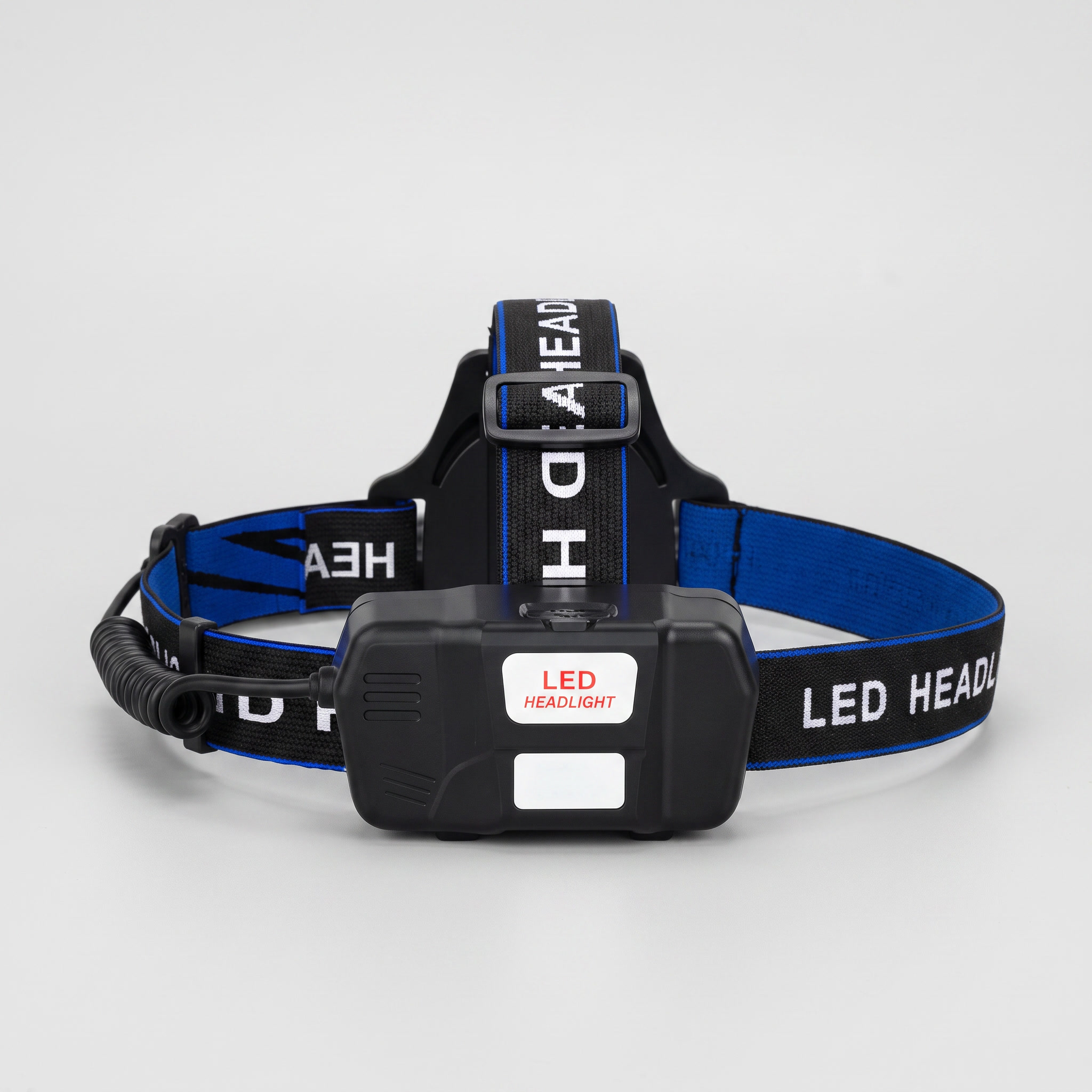 Rear view of the head torch showing the battery compartment and harness