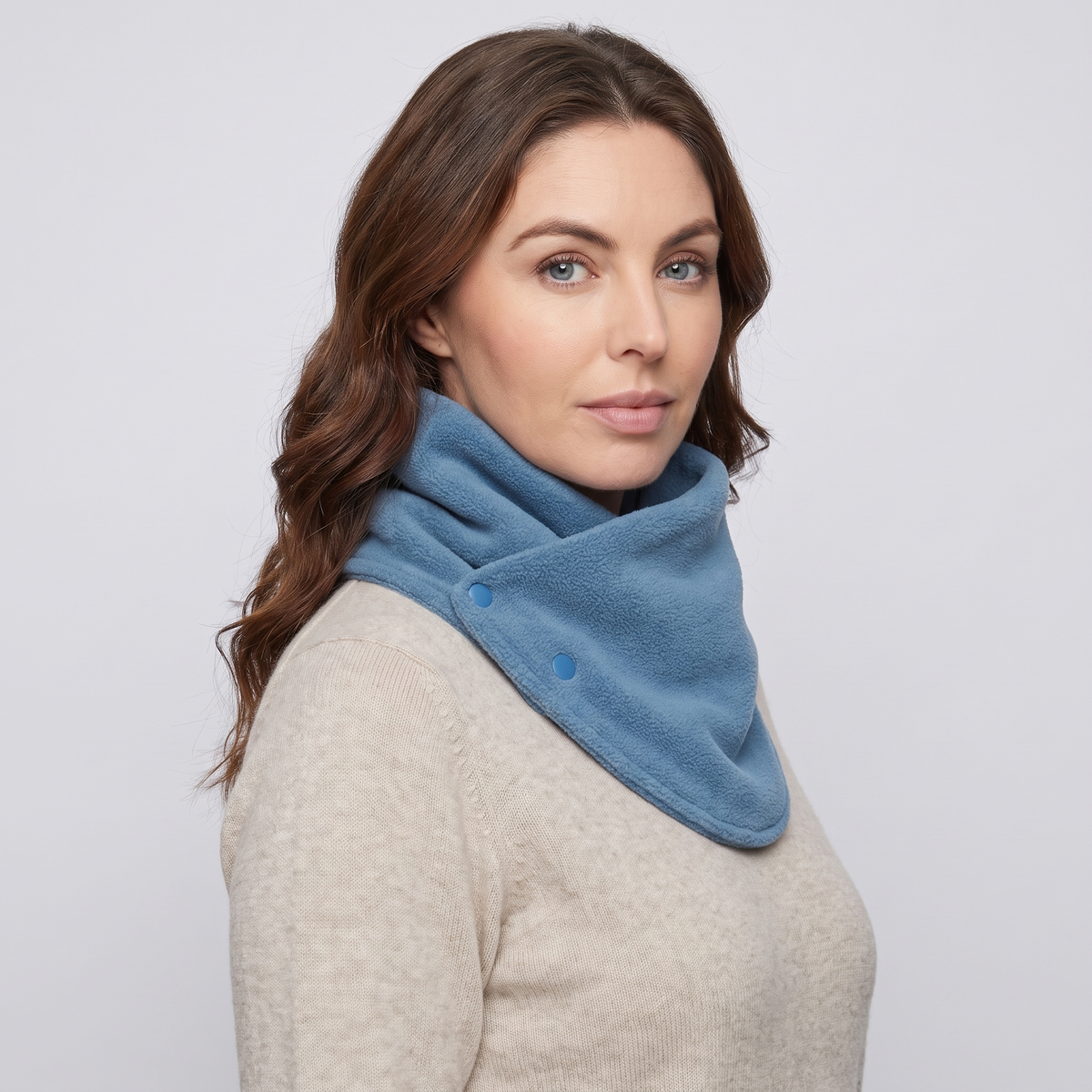 Fleece Snood neck warmer in Light Blue, three-quarter view showing the two poppers