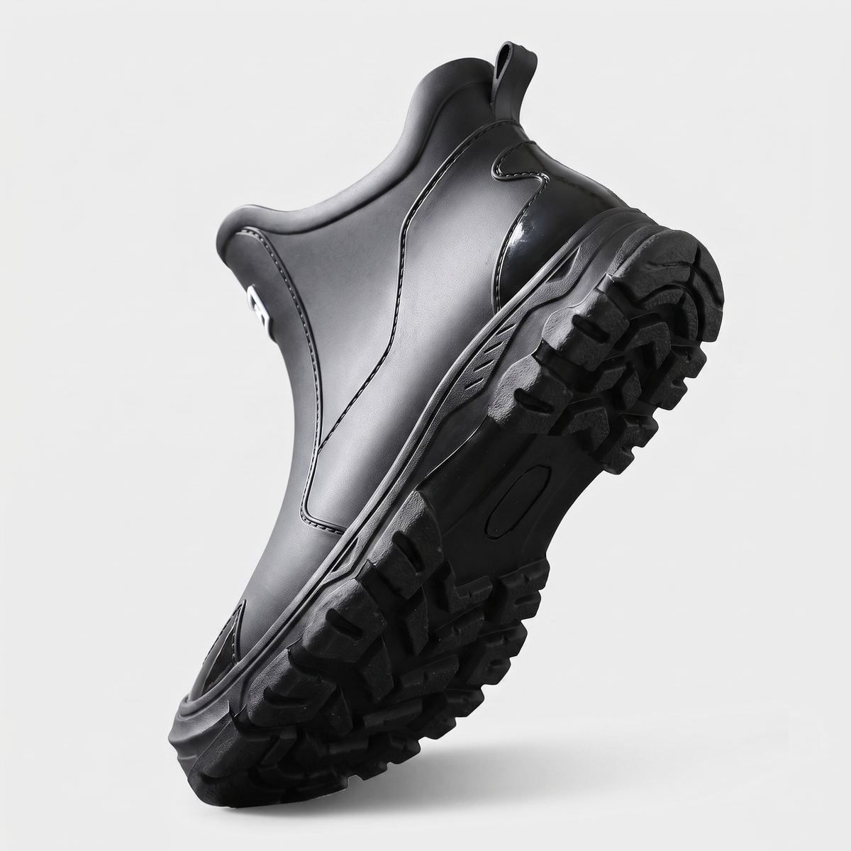 The lugged PVC outsole of the ankle wellies