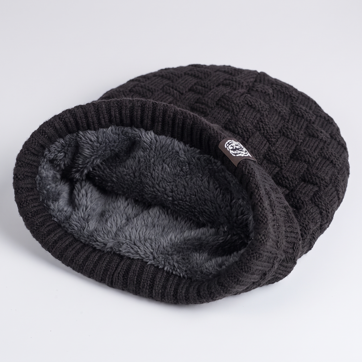 Inside the beanie showing the fleece lining