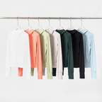 All seven colourways of the women's zip-up sun hoodie hanging on a rail
