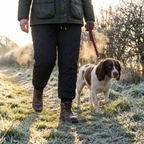 Women's fleece lined quilted trousers on a frosty morning dog walk in Britain