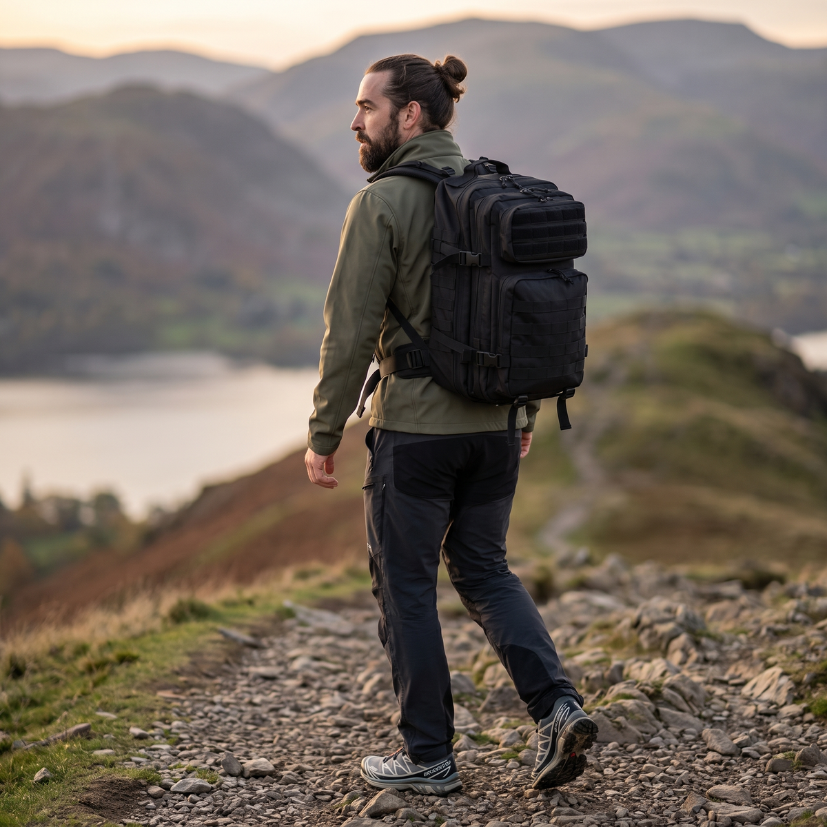 Walker on a Lake District ridge carrying the 45L hiking rucksack