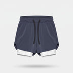 Men's 2 in 1 running shorts in Navy with a white compression liner, front view