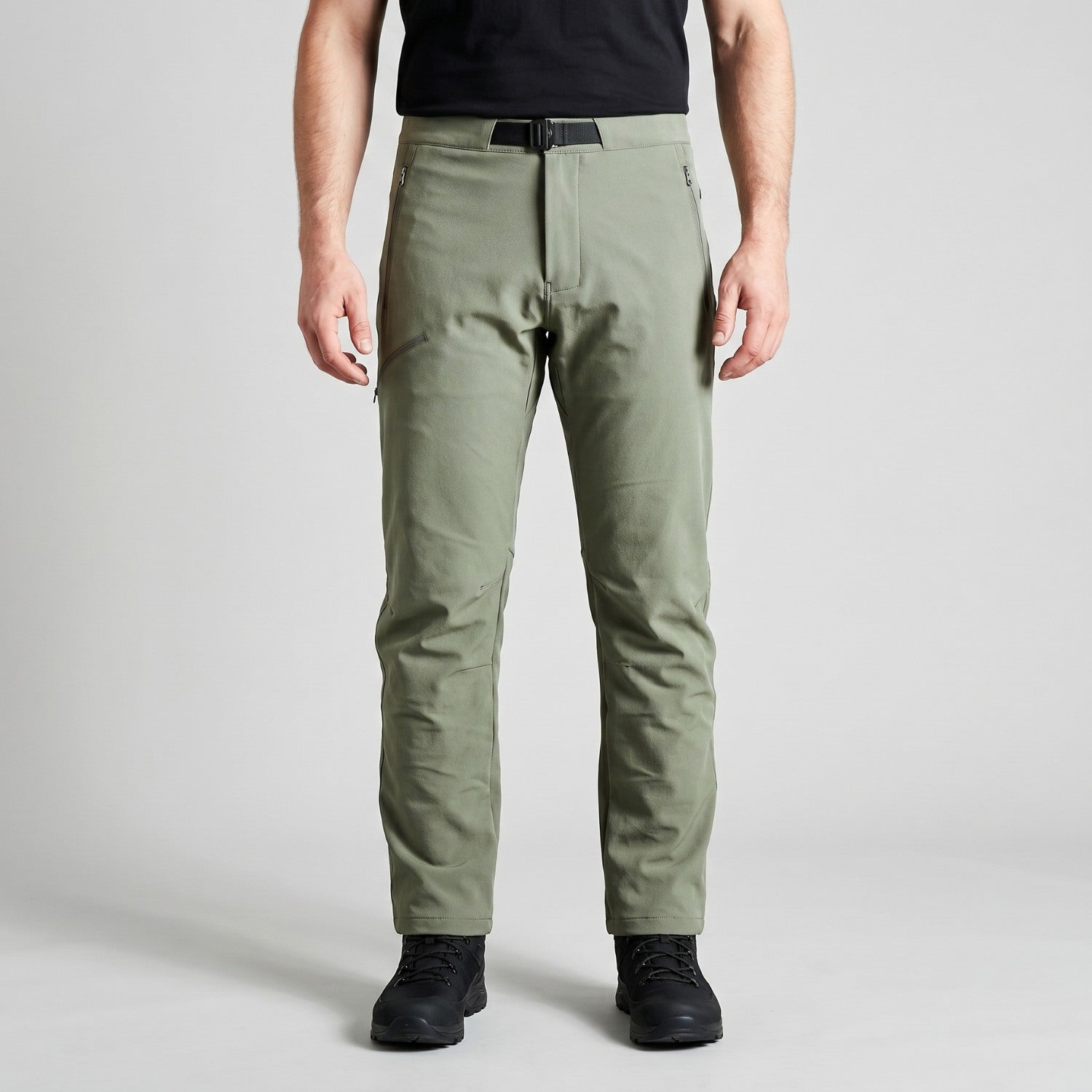 Men's sage green walking trousers worn, front detail