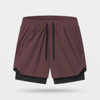 Men's 2 in 1 running shorts in Burgundy with a black compression liner, front view