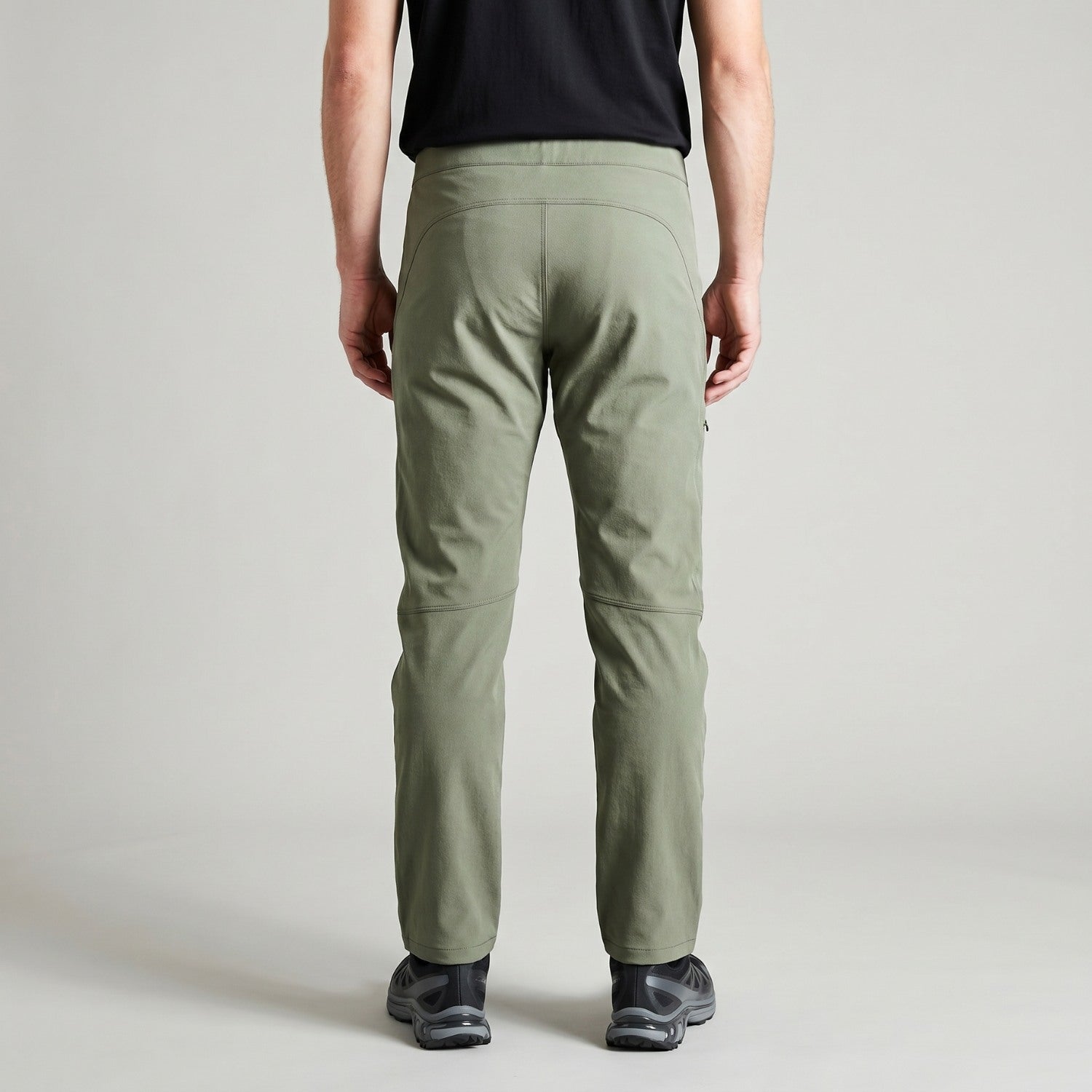 Men's sage green walking trousers worn, back view