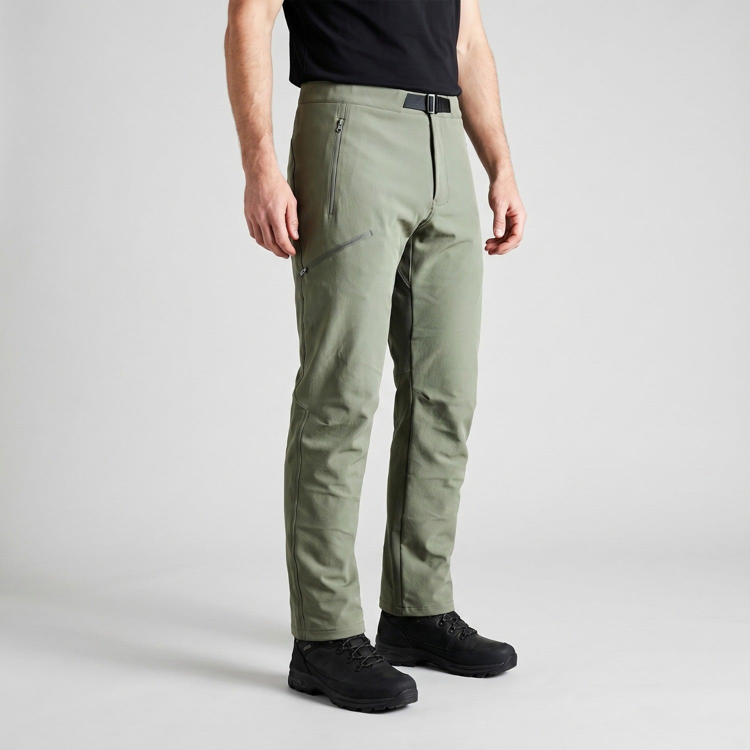Men's sage green walking trousers worn, side view