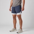 Three-quarter side view of the Navy 2 in 1 running shorts