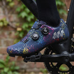 Dark Blue road cycling shoe clipped onto a clipless pedal