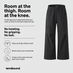 How the women's wide leg walking trousers work: room at the thigh and knee, an elasticated drawcord waist that stays up without a belt, and a cord hem that closes at the ankle