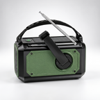 Back of the green emergency radio with fold-out hand crank, solar panel and carry handle