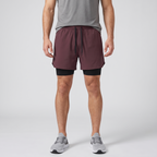 Man wearing the Burgundy 2 in 1 running shorts, front view
