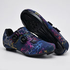 Dark Blue cycling shoes with road soles, a pair with one sole turned up to show the cleat holes